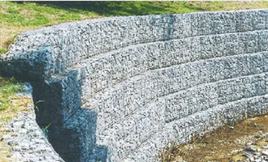 Shown here is a multi course gabion retaining wall with curved face