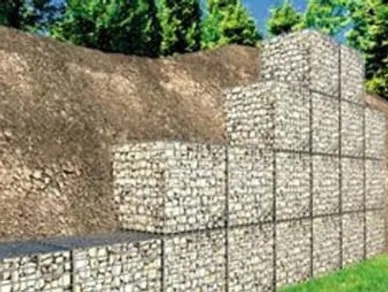 Shown here is a gabion retaining wall with decorator rocks